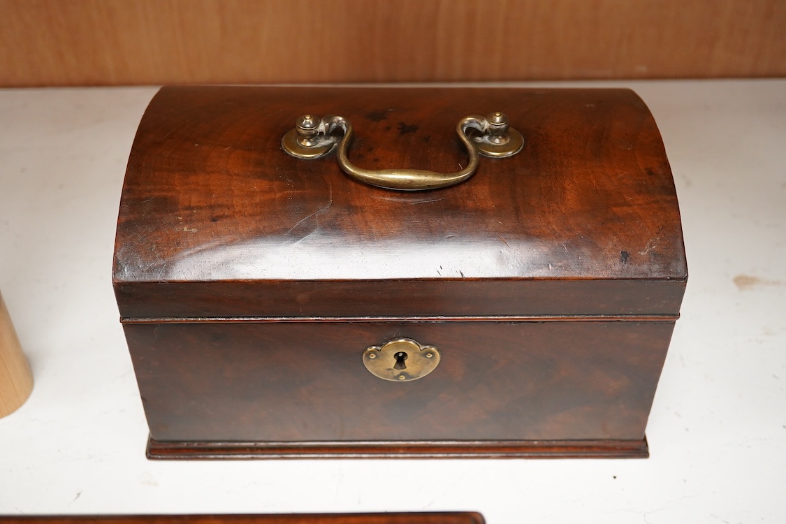 A George III mahogany dome-top tea caddy, together with another, 23cm wide